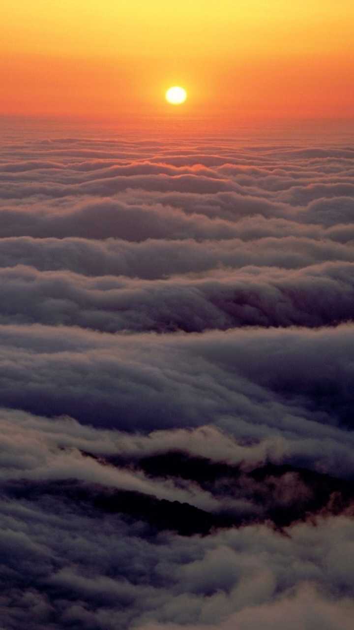 White Clouds During Golden Hour. Wallpaper in 720x1280 Resolution