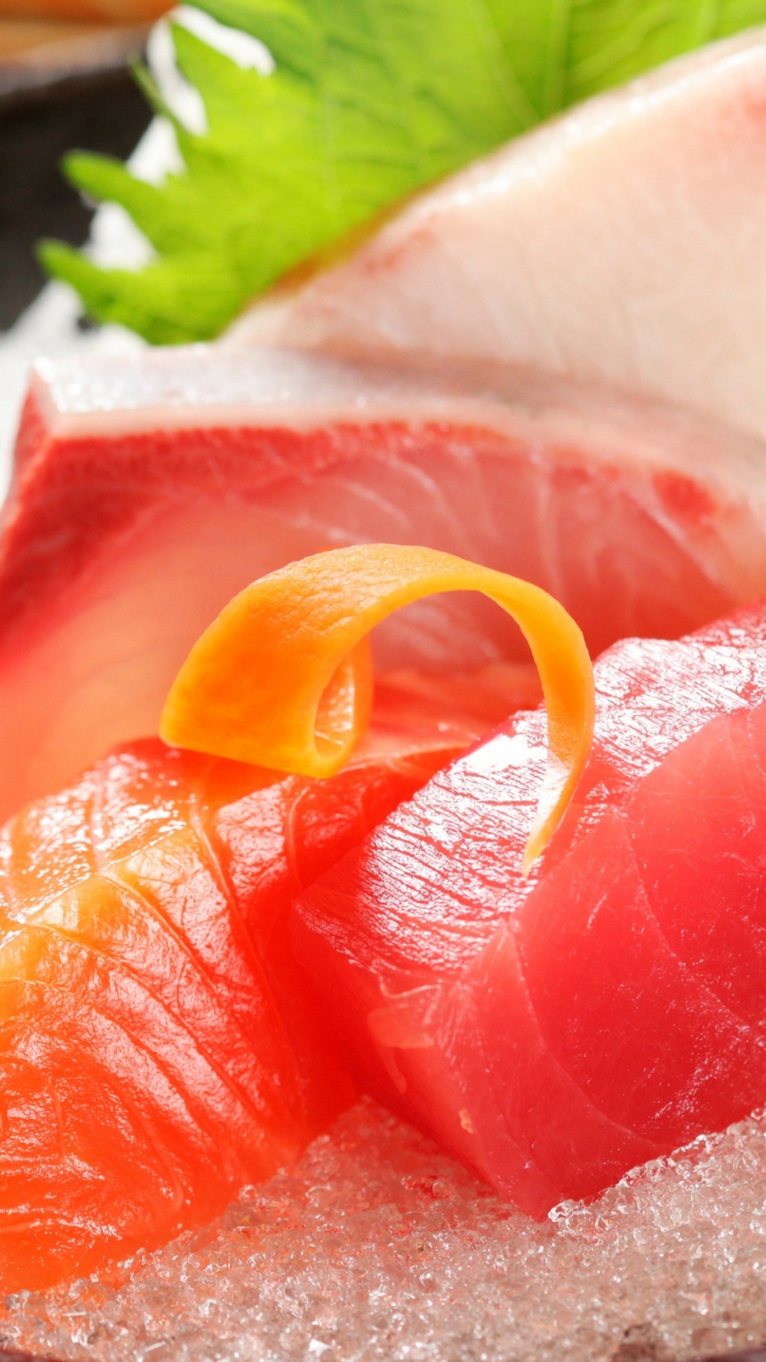 Sliced of Orange Fruit on Black Plate. Wallpaper in 1080x1920 Resolution