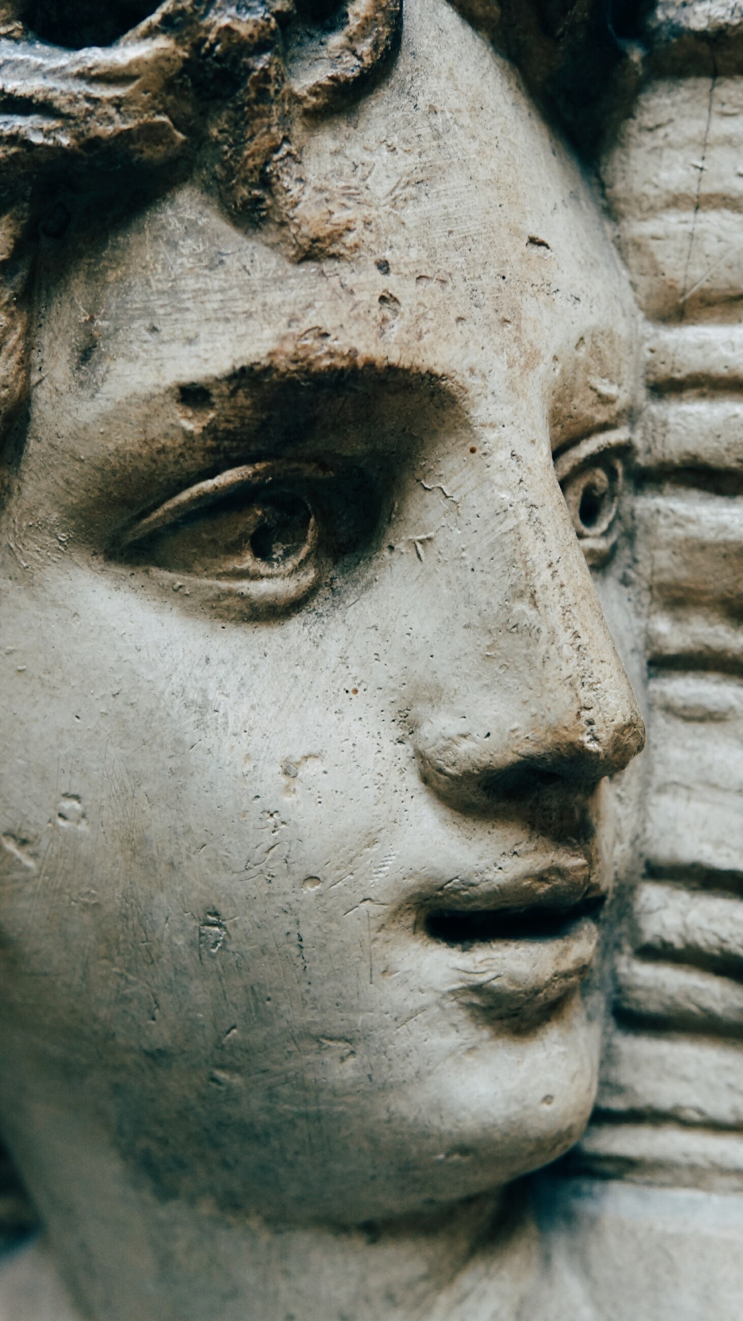 Gray Concrete Statue of Man. Wallpaper in 1080x1920 Resolution