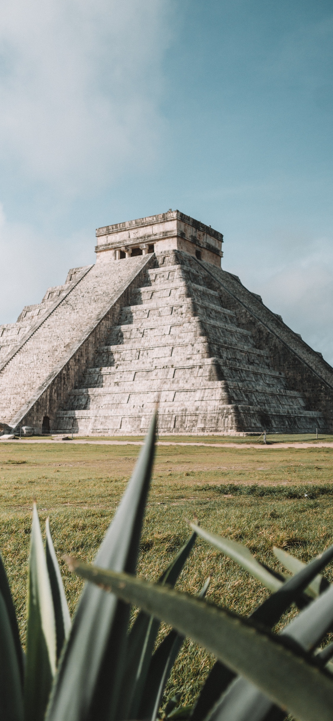 Gray Concrete Pyramid Under White Sky During Daytime. Wallpaper in 1125x2436 Resolution