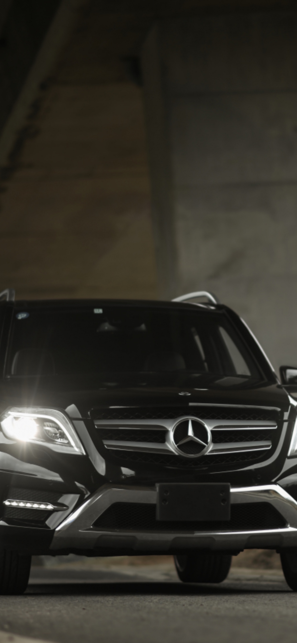 Black Bmw m 3 Parked in Tunnel. Wallpaper in 1242x2688 Resolution