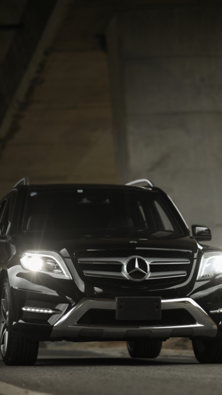 Black Bmw m 3 Parked in Tunnel. Wallpaper in 750x1334 Resolution