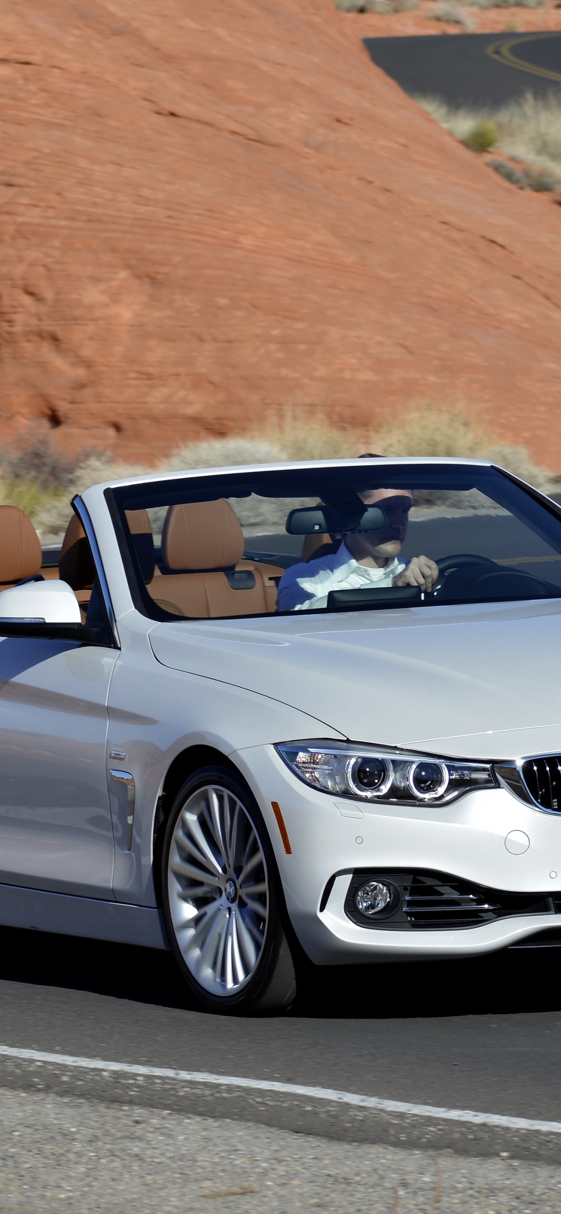 Silver Mercedes Benz Convertible Coupe Parked on Gray Asphalt Road During Daytime. Wallpaper in 1125x2436 Resolution