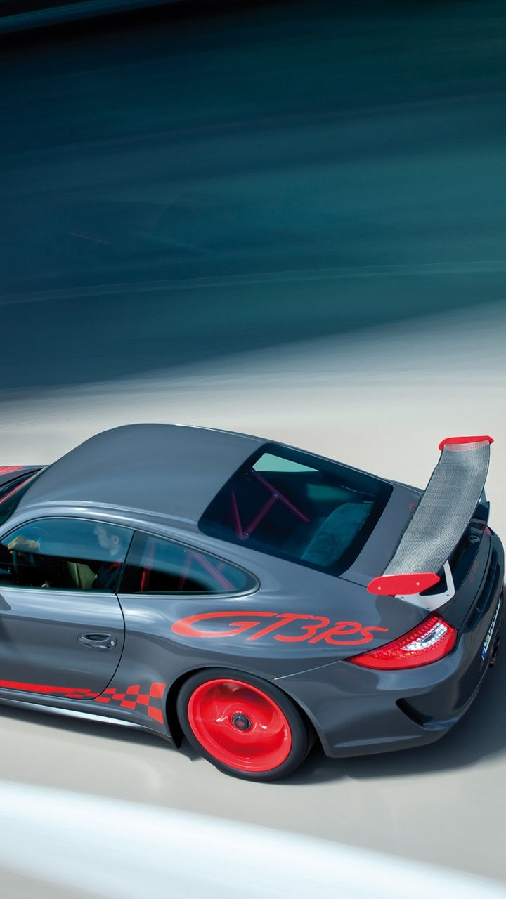 Roter Porsche 911 Unterwegs. Wallpaper in 720x1280 Resolution