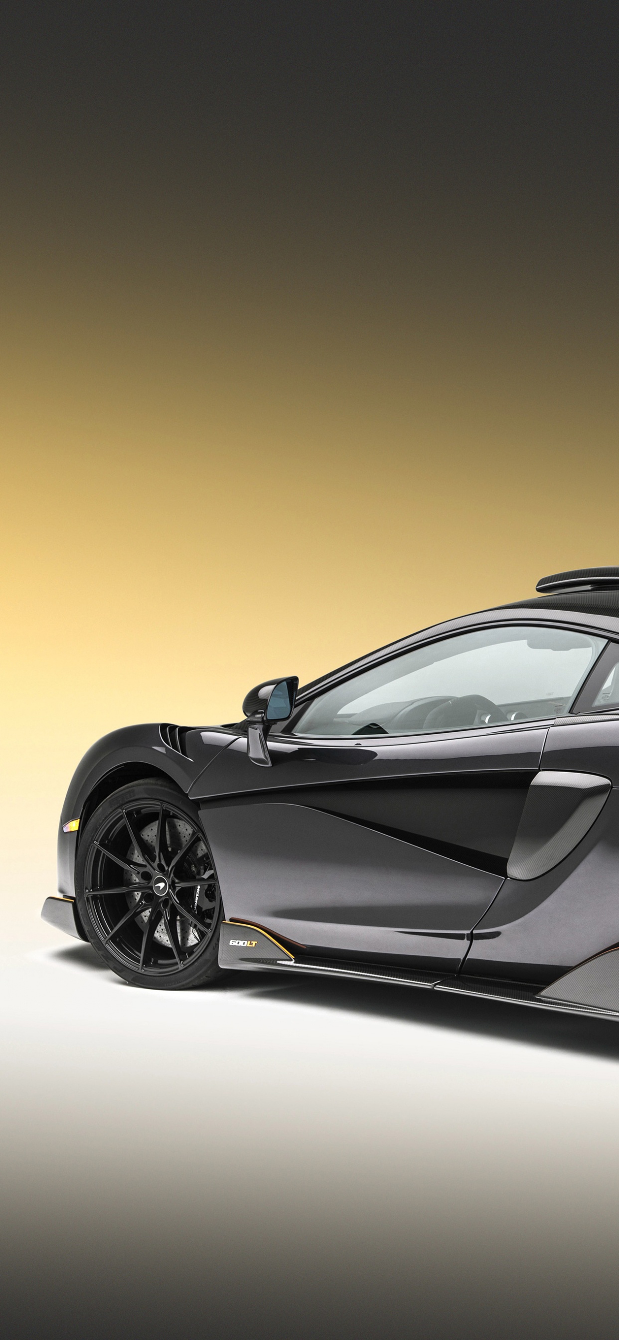 Black Porsche 911 on White Background. Wallpaper in 1242x2688 Resolution