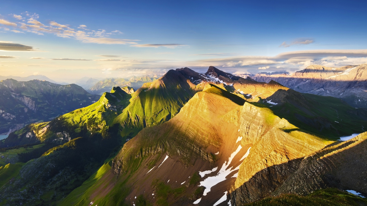 Brown and Green Mountains Under Blue Sky During Daytime. Wallpaper in 1280x720 Resolution