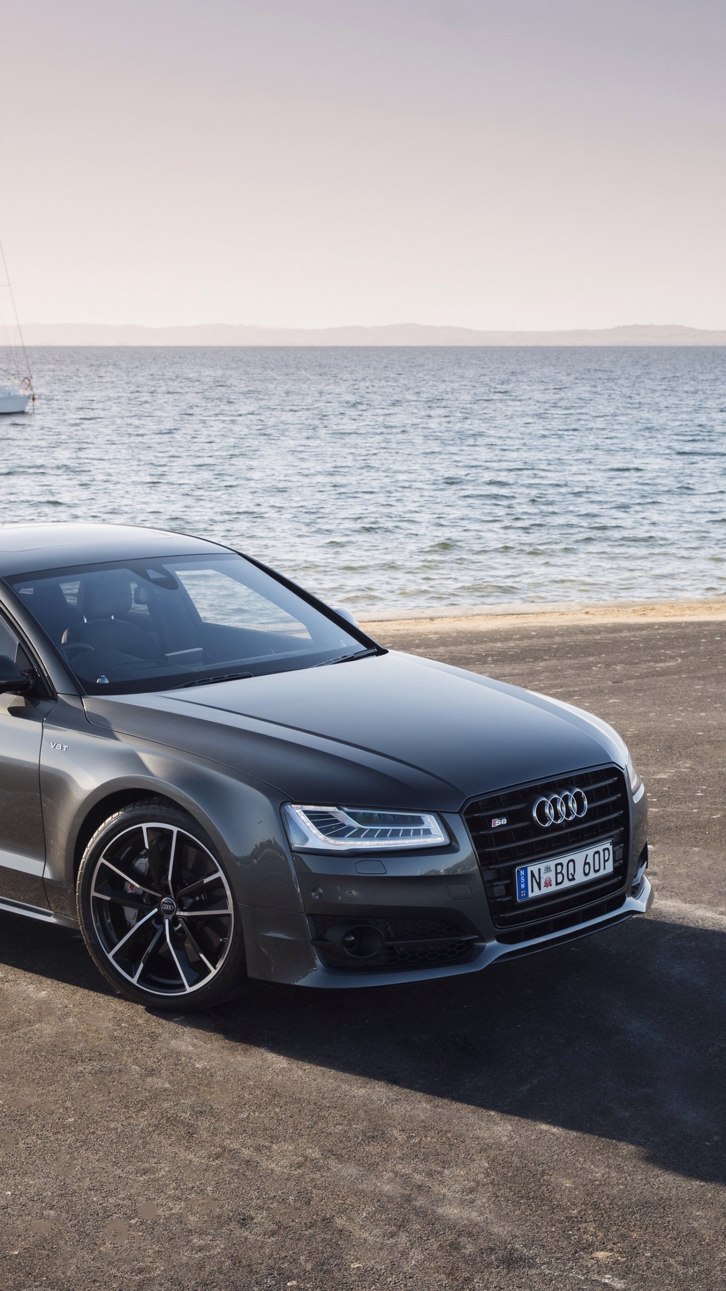 Black Audi a 4 on Beach During Daytime. Wallpaper in 1440x2560 Resolution