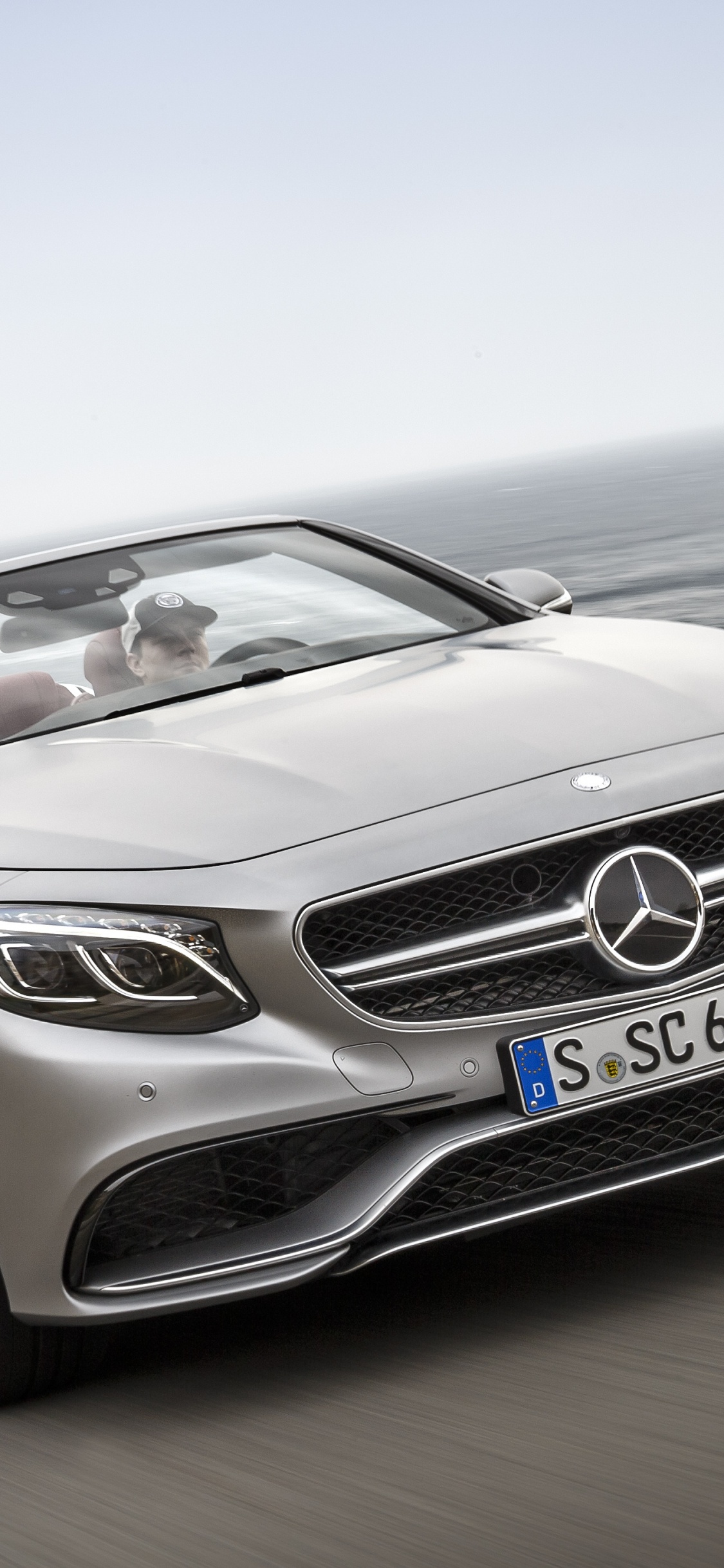 Gray Mercedes Benz Convertible Coupe on Road During Daytime. Wallpaper in 1125x2436 Resolution