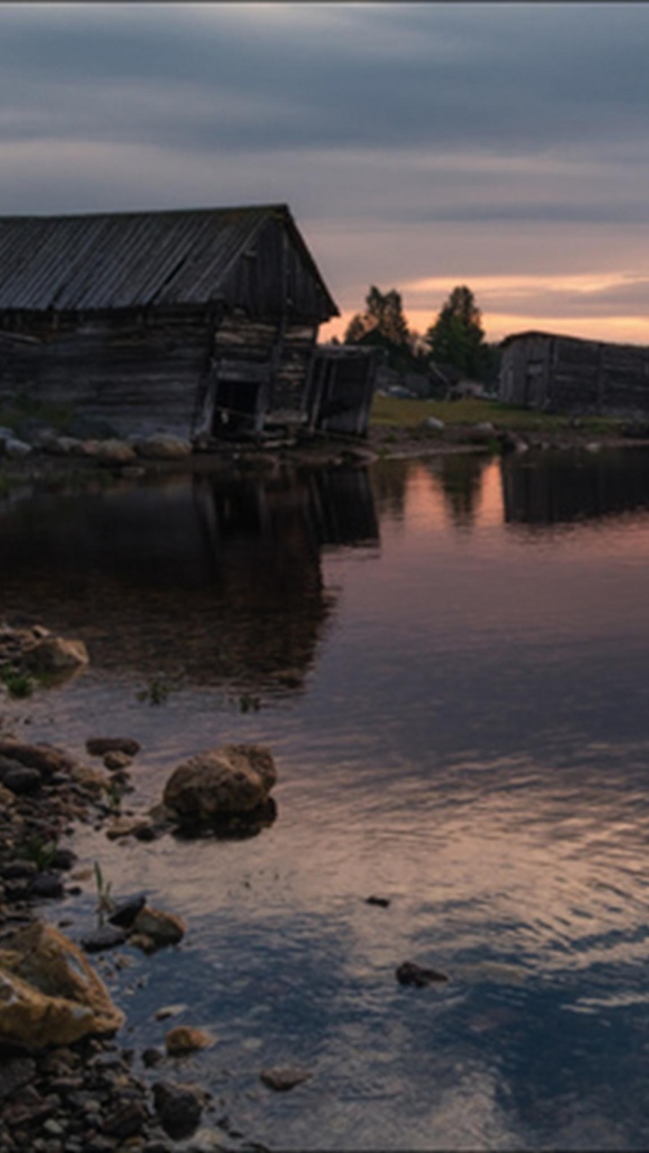 Brown Wooden House on Water During Sunset. Wallpaper in 720x1280 Resolution