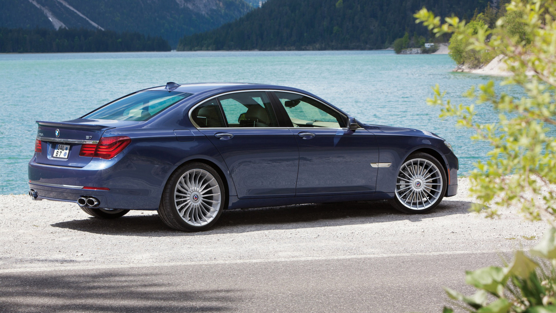 Black Sedan on Gray Asphalt Road During Daytime. Wallpaper in 1920x1080 Resolution