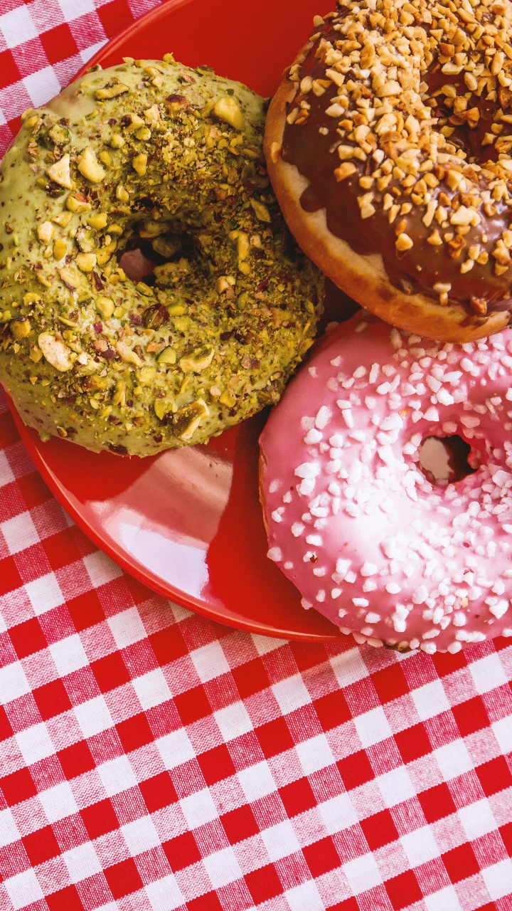 Brown Doughnut on Red and White Checkered Table Cloth. Wallpaper in 720x1280 Resolution