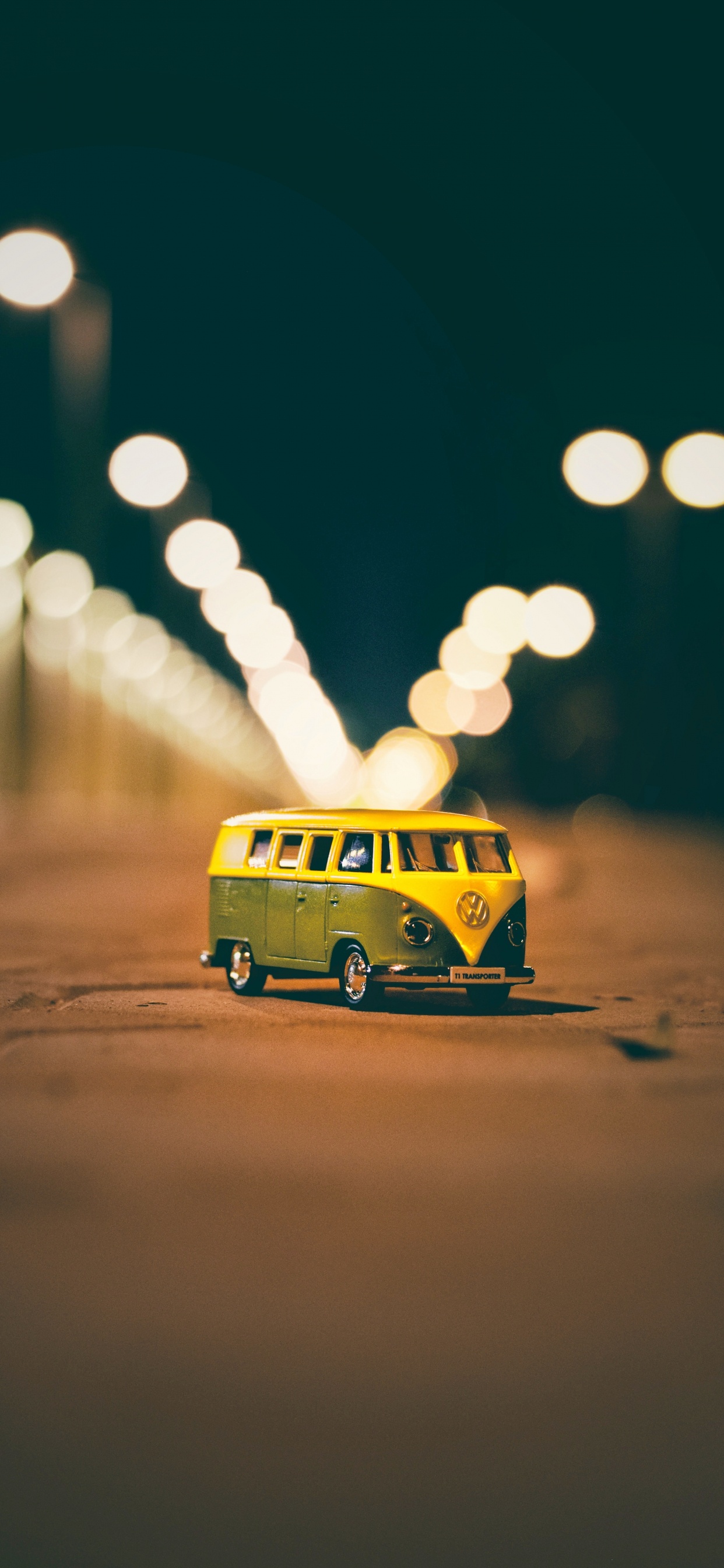 Yellow Bus on Road During Night Time. Wallpaper in 1242x2688 Resolution