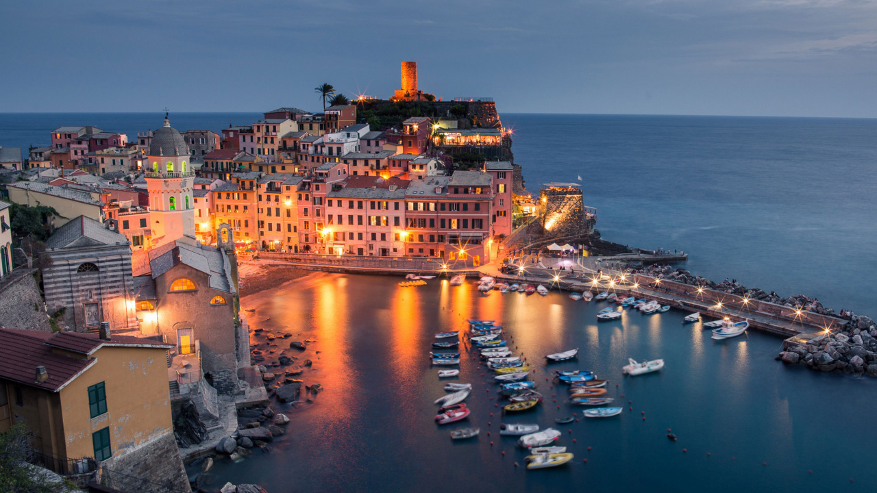 High Rise Buildings Near Body of Water During Night Time. Wallpaper in 1280x720 Resolution