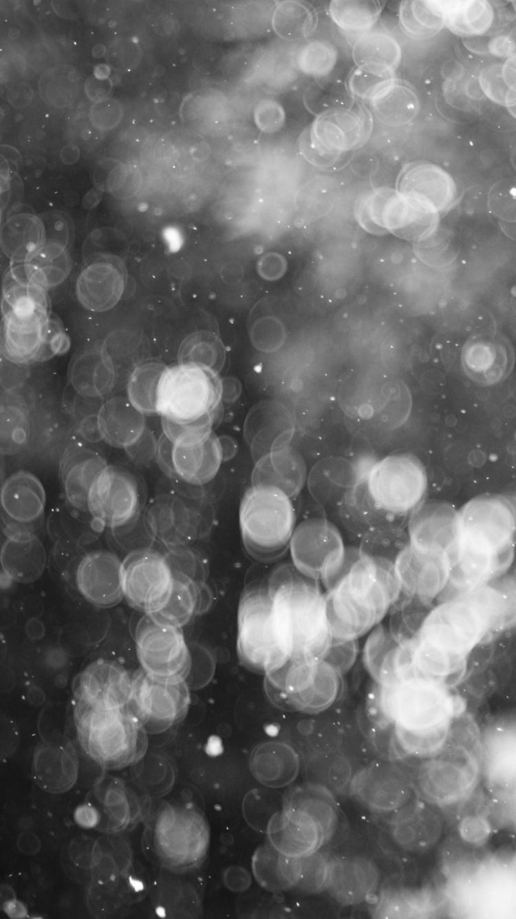 Grayscale Photo of Water Droplets. Wallpaper in 750x1334 Resolution