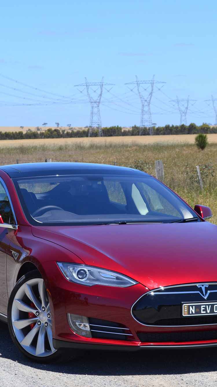 Red Audi Coupe on Road During Daytime. Wallpaper in 750x1334 Resolution