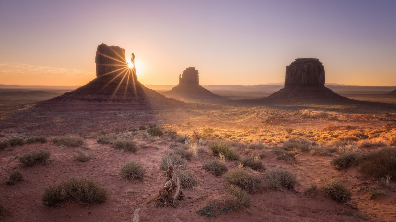 Brown Rock Formation Near Body of Water During Daytime. Wallpaper in 1366x768 Resolution