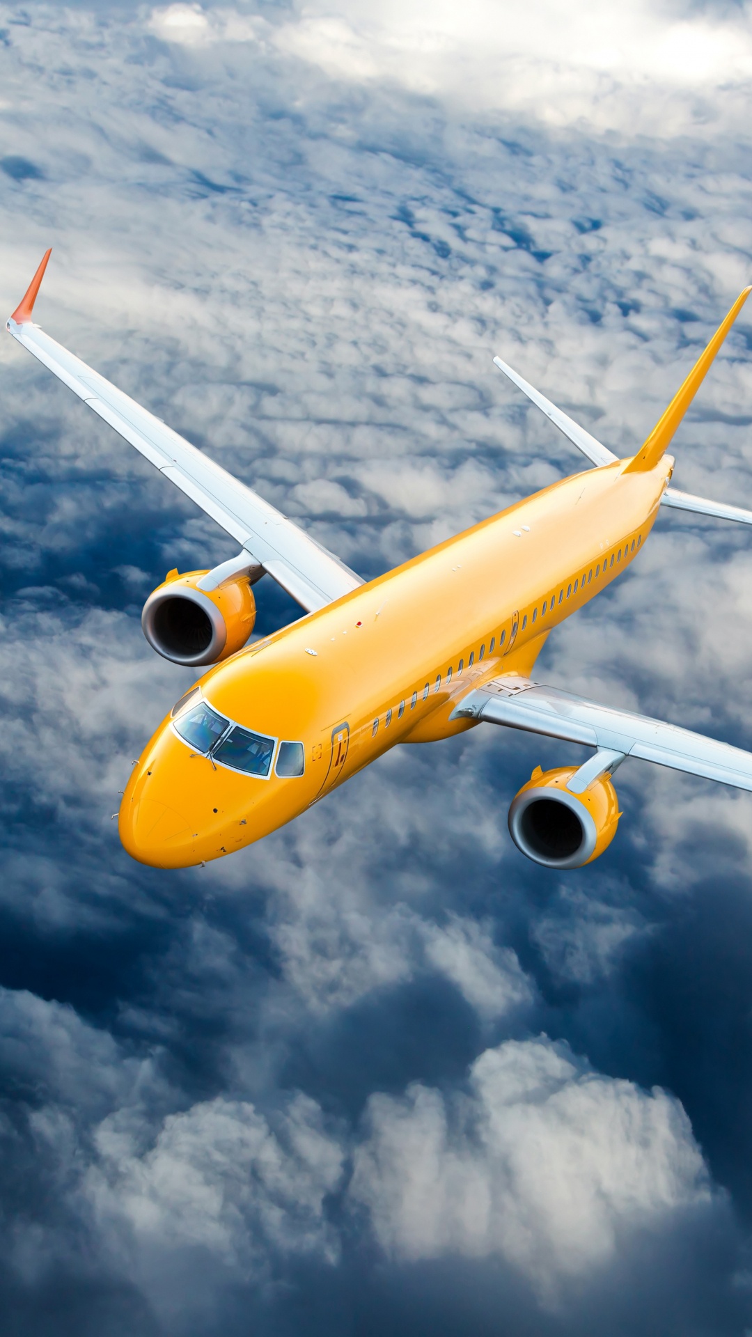 Avion Jaune et Blanc Volant Sous Des Nuages Blancs Pendant la Journée. Wallpaper in 1080x1920 Resolution