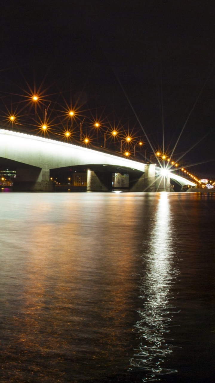 White Bridge Over Body of Water During Night Time. Wallpaper in 720x1280 Resolution