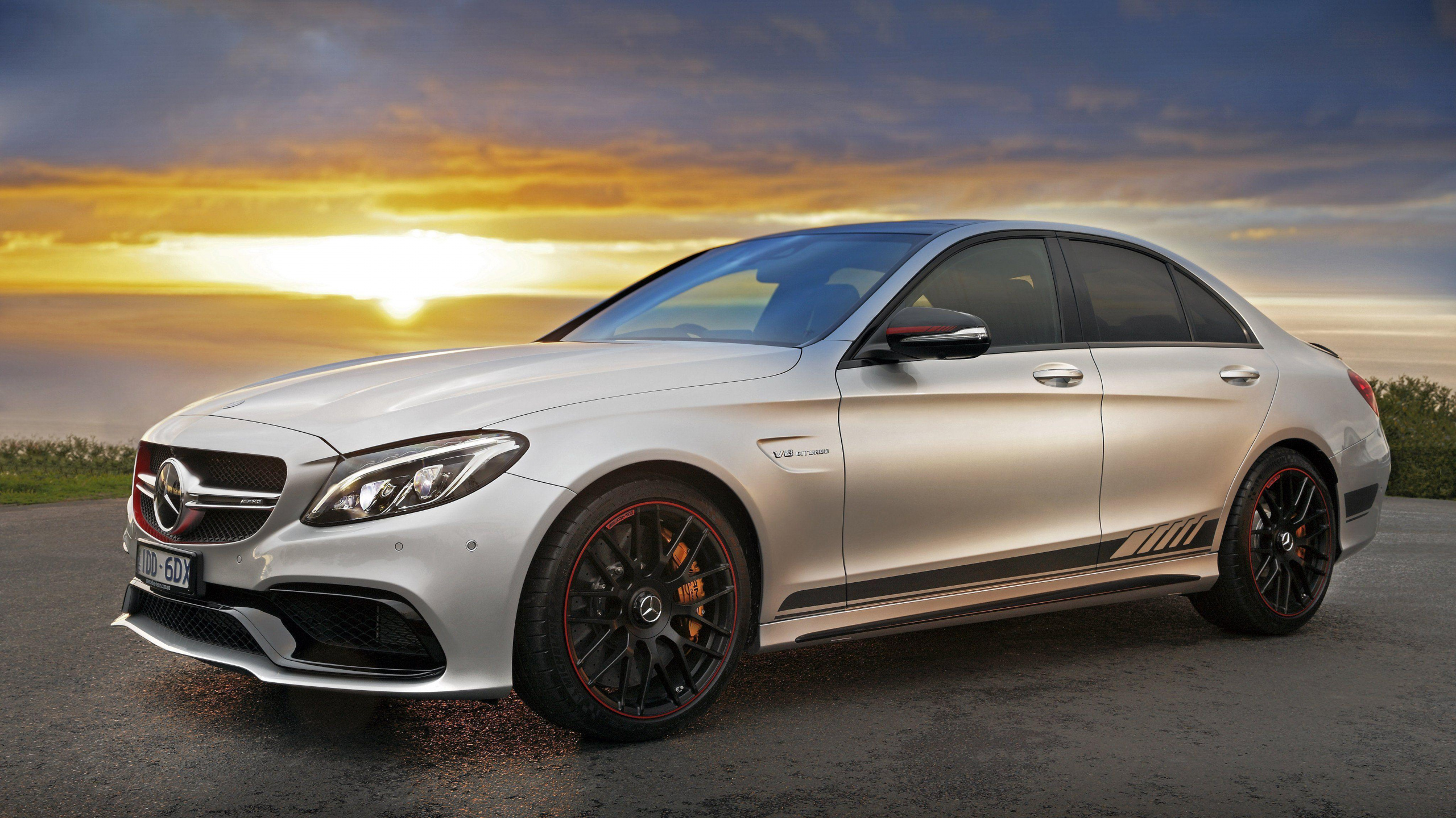 Silver Mercedes Benz Coupe on Gray Asphalt Road During Sunset. Wallpaper in 2560x1440 Resolution