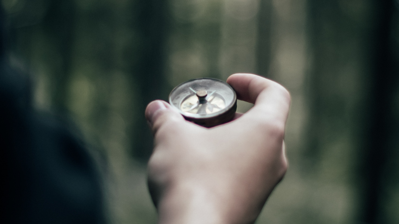 Person Holding Silver Round Coin. Wallpaper in 1280x720 Resolution
