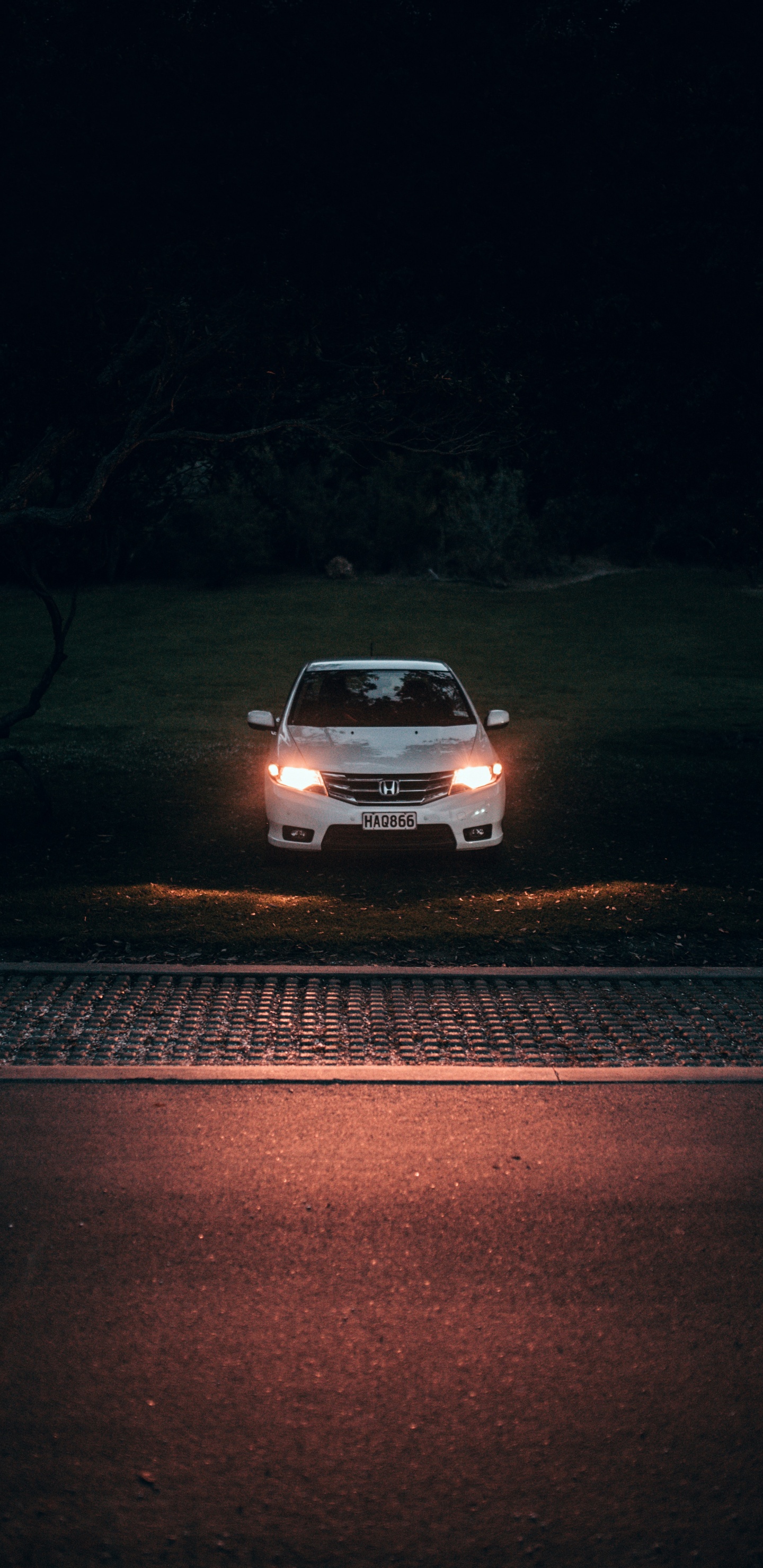 White Car on Road During Night Time. Wallpaper in 1440x2960 Resolution
