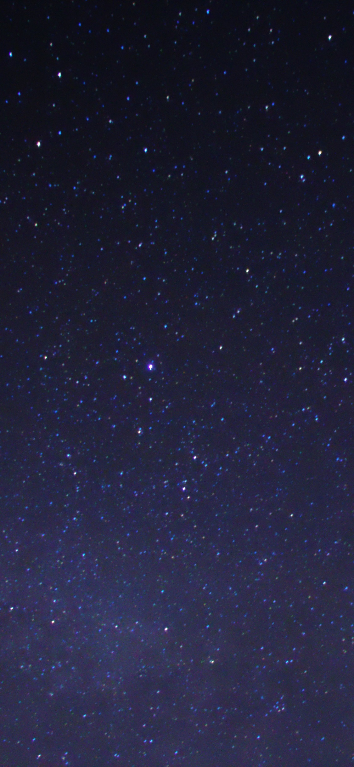 Starry Night Sky Over The Starry Night. Wallpaper in 1125x2436 Resolution