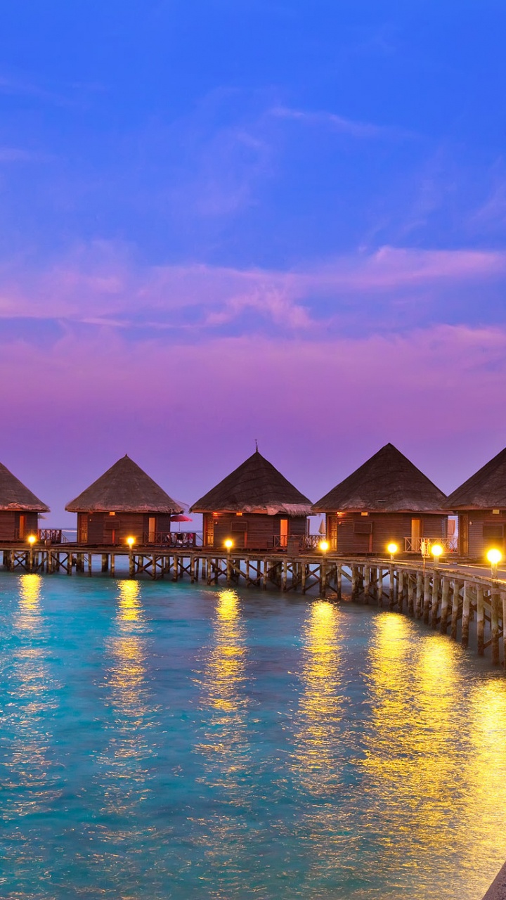 Brown Wooden Dock on Water During Sunset. Wallpaper in 720x1280 Resolution
