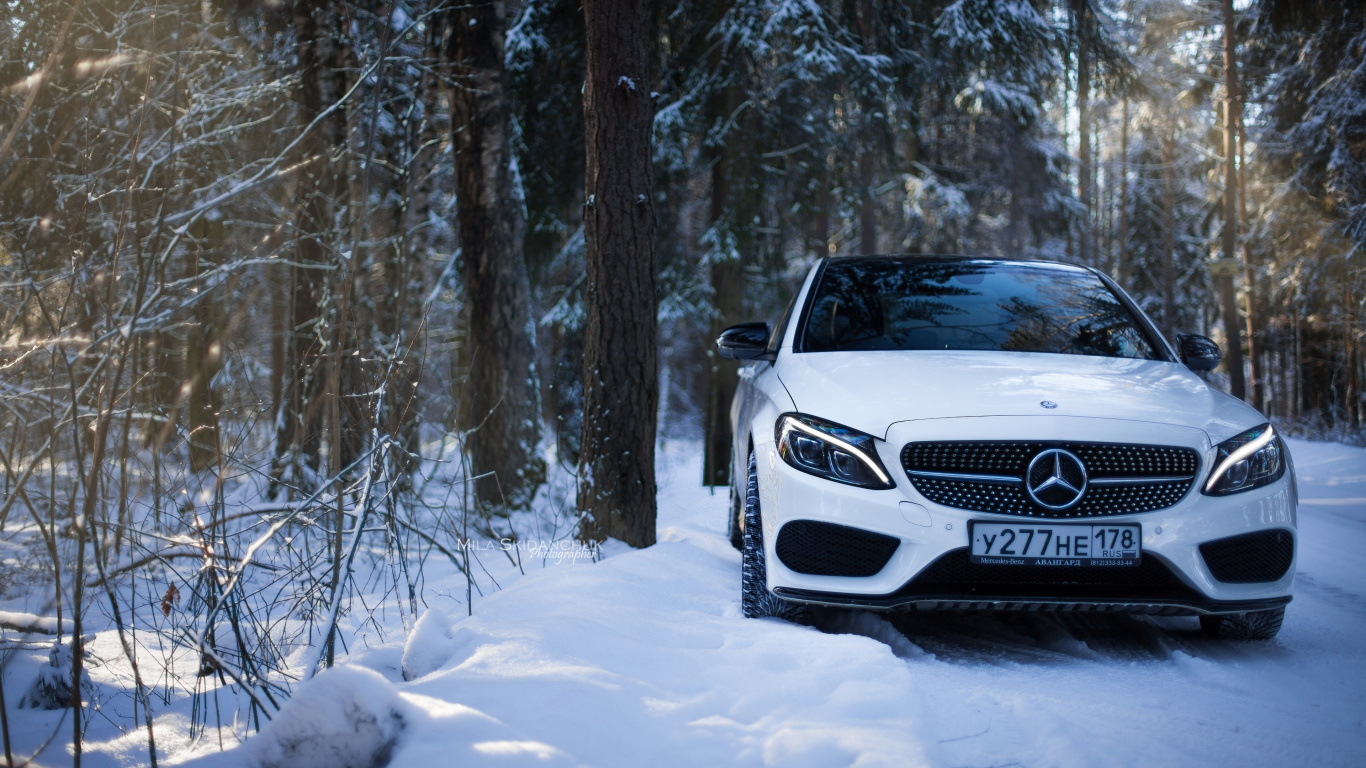 White Mercedes Benz Car on Snow Covered Ground. Wallpaper in 1366x768 Resolution