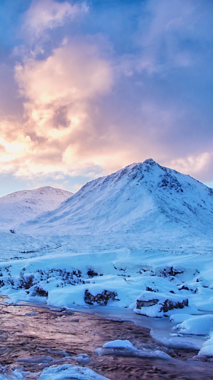 Snow Covered Mountain Under Cloudy Sky During Daytime. Wallpaper in 720x1280 Resolution