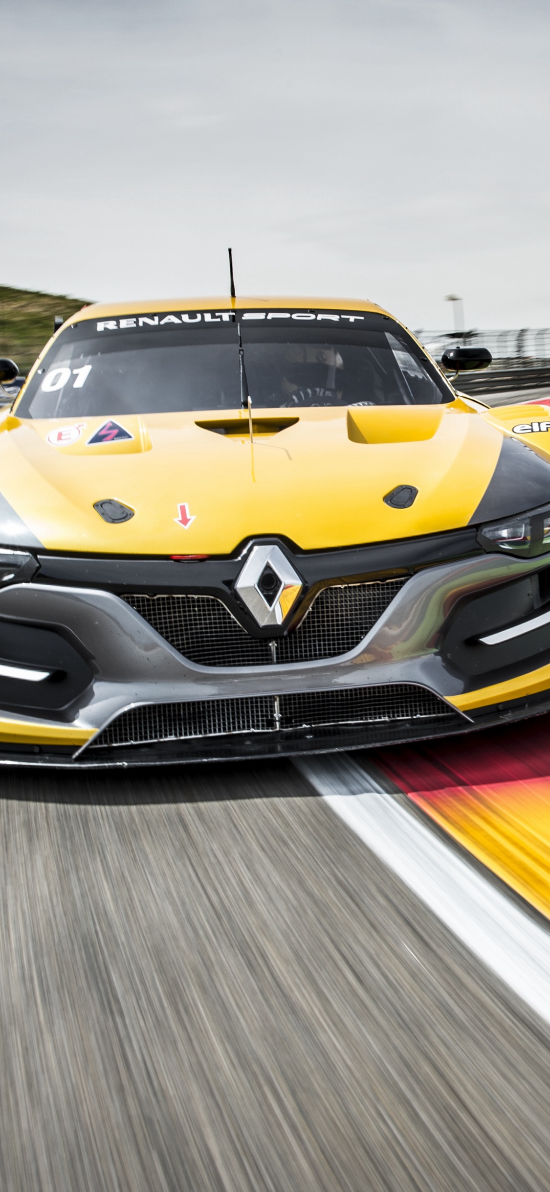 Bmw m 3 Jaune Sur Route. Wallpaper in 1125x2436 Resolution