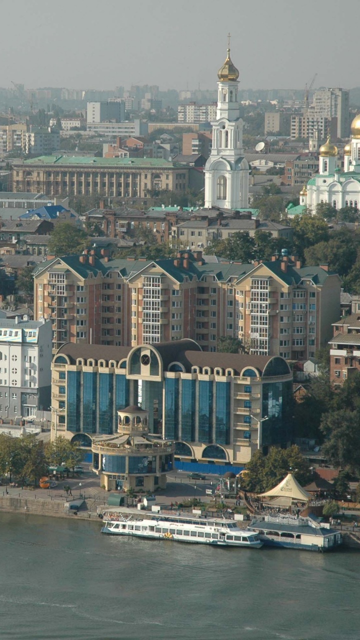 Luftaufnahme Von Stadtgebäuden Tagsüber. Wallpaper in 720x1280 Resolution