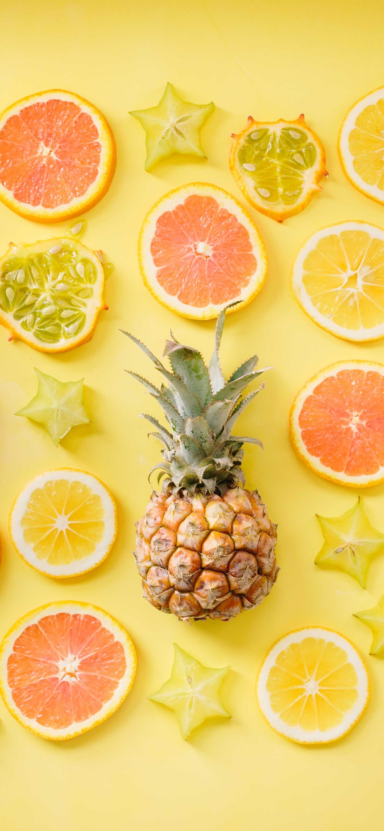 Fruits Orange Tranchés et Fruits Ananas. Wallpaper in 1242x2688 Resolution