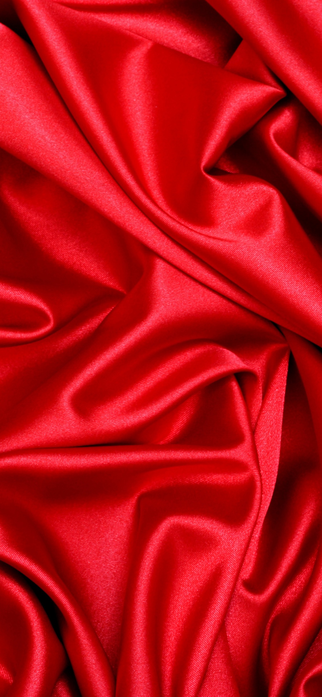 Red Textile in Close up Photography. Wallpaper in 1125x2436 Resolution
