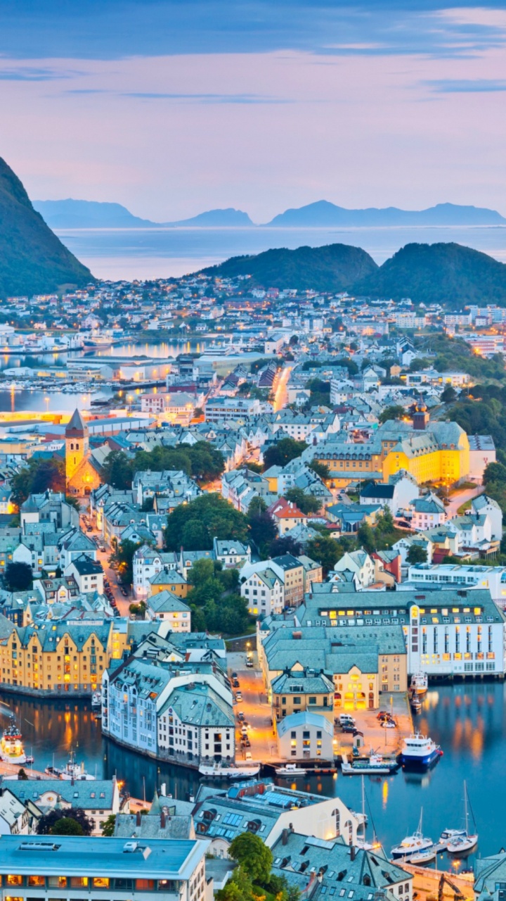 Aerial View of City Near Mountain During Daytime. Wallpaper in 720x1280 Resolution