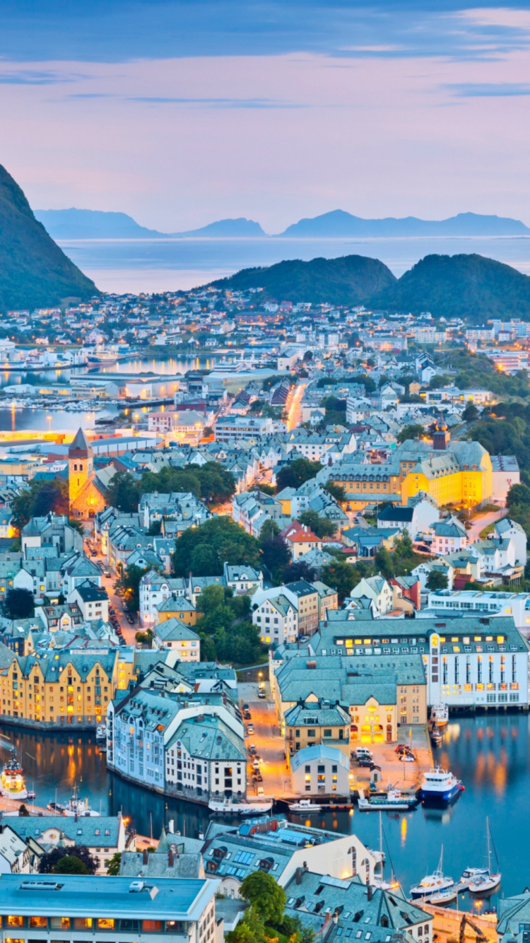 Aerial View of City Near Mountain During Daytime. Wallpaper in 750x1334 Resolution