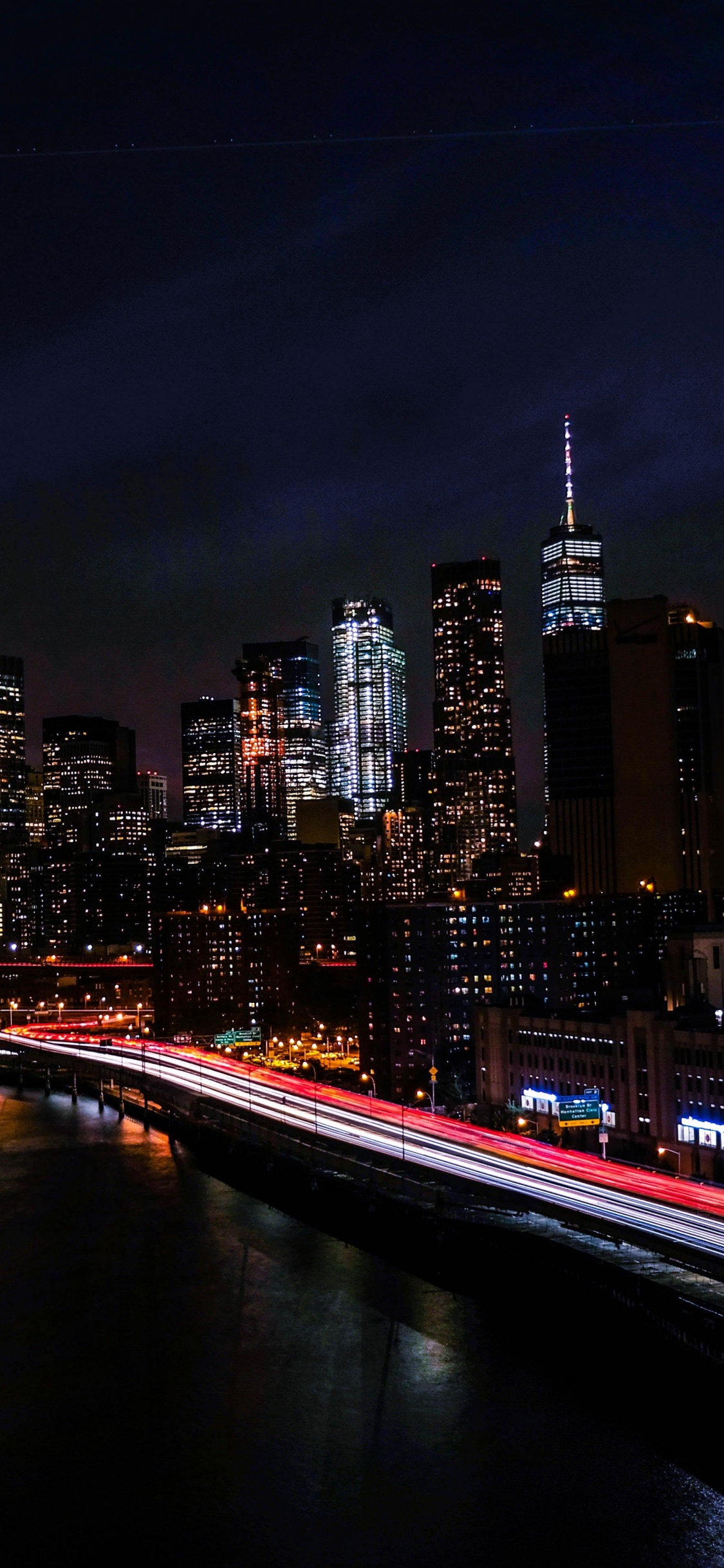 Horizonte de la Ciudad Durante la Noche. Wallpaper in 1125x2436 Resolution