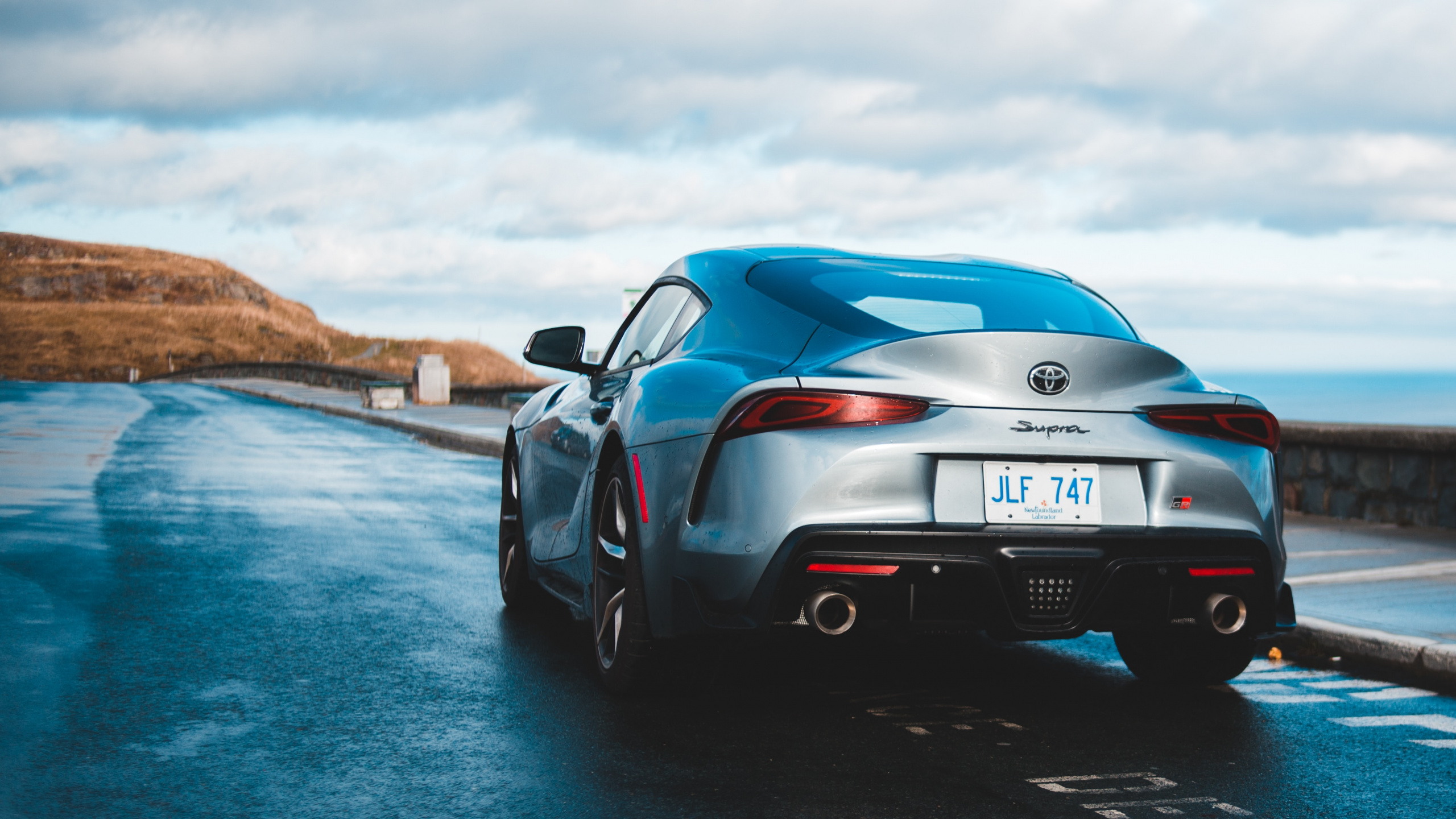 Black Porsche 911 on Beach Shore During Daytime. Wallpaper in 2560x1440 Resolution
