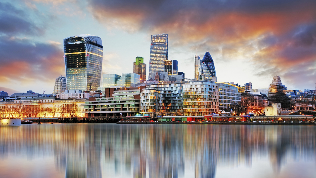 City Skyline Across Body of Water During Night Time. Wallpaper in 1280x720 Resolution