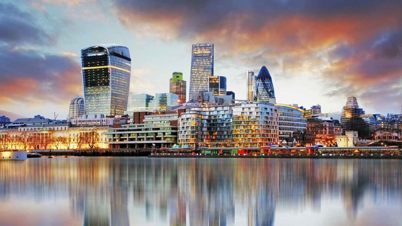 City Skyline Across Body of Water During Night Time. Wallpaper in 1366x768 Resolution