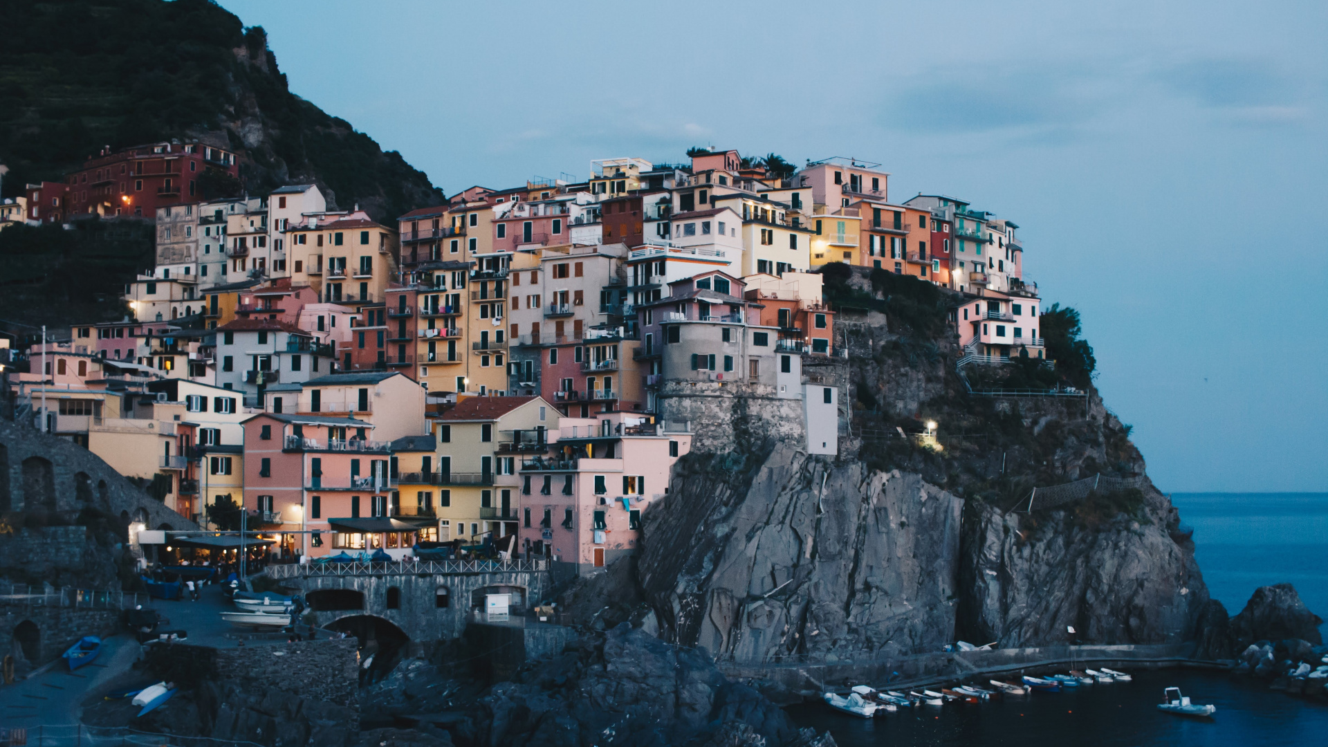 White and Brown Concrete Buildings on Mountain. Wallpaper in 1920x1080 Resolution