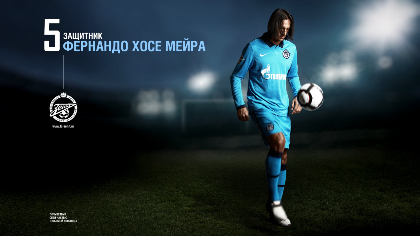 Man in Blue Soccer Jersey Holding Soccer Ball. Wallpaper in 1366x768 Resolution