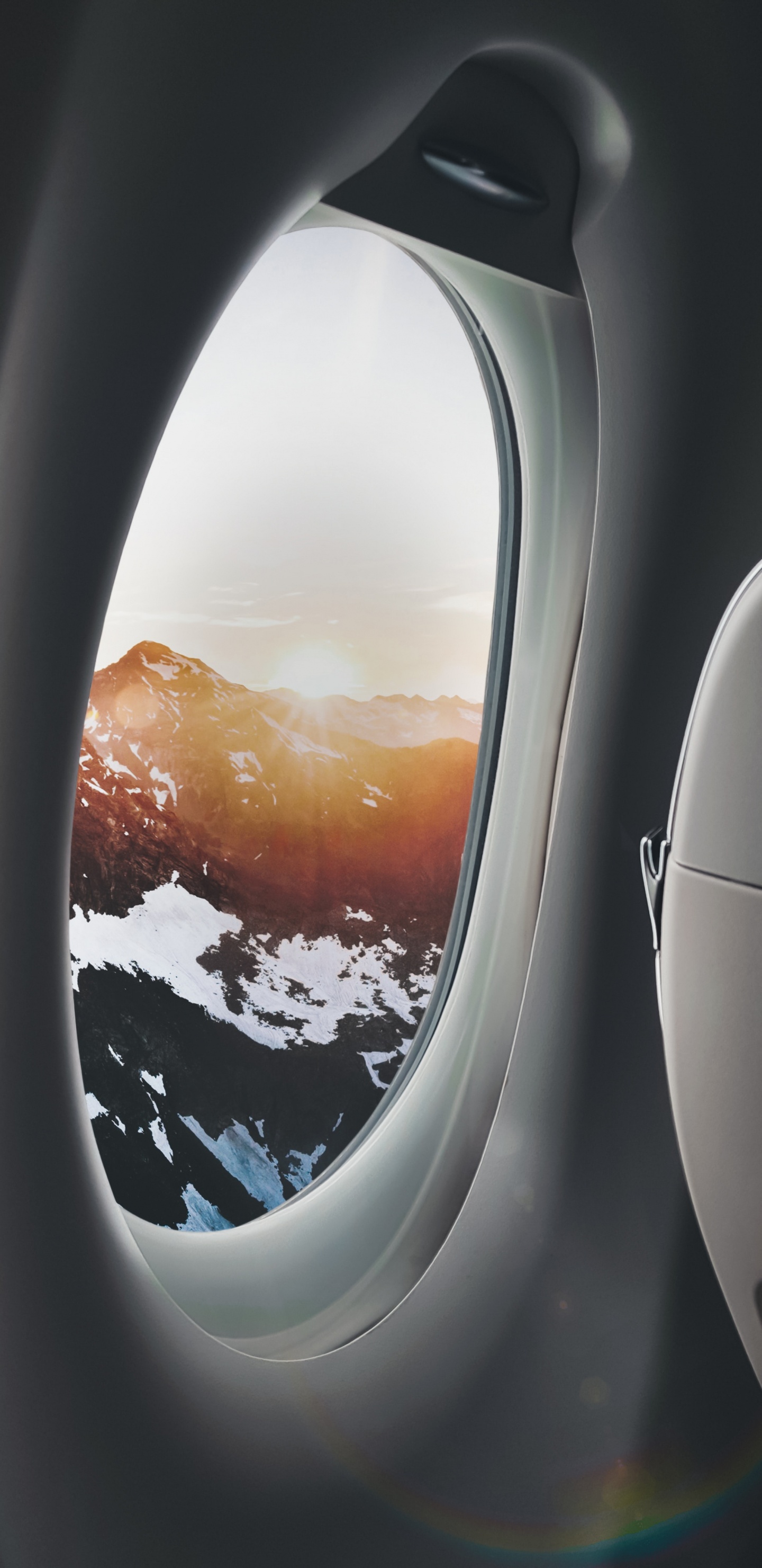 Flugzeugfenster Blick Auf Wolken Tagsüber During. Wallpaper in 1440x2960 Resolution