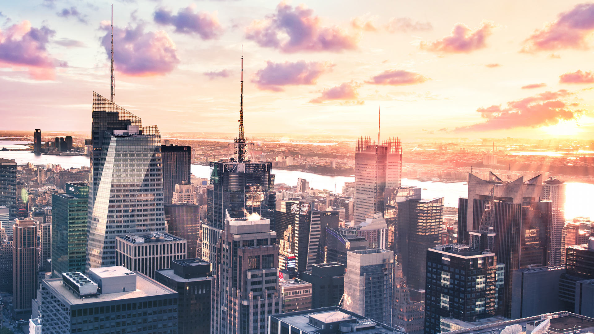 City Skyline Under Orange and Gray Cloudy Sky During Sunset. Wallpaper in 1920x1080 Resolution