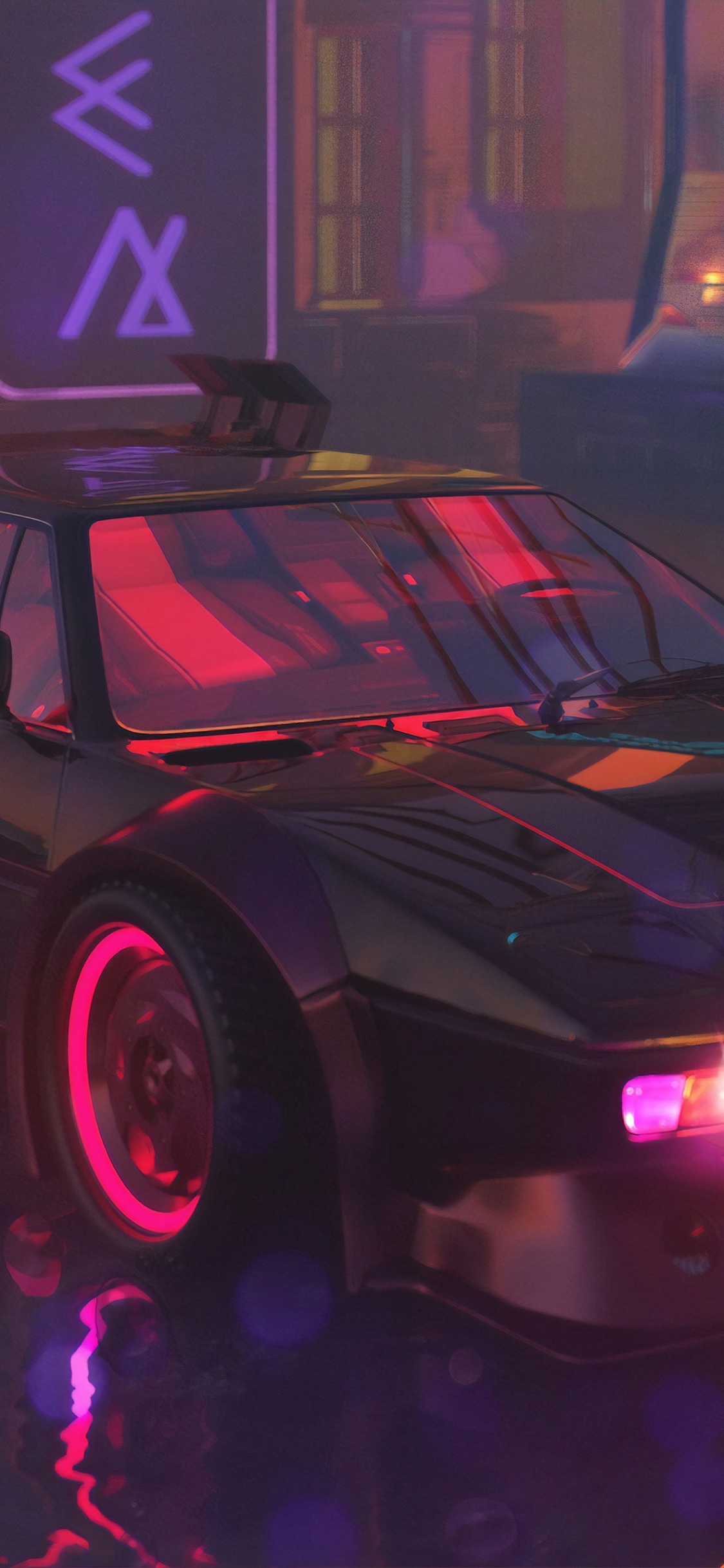 Porsche 911 Noire Garée Près du Bâtiment Pendant la Nuit. Wallpaper in 1125x2436 Resolution