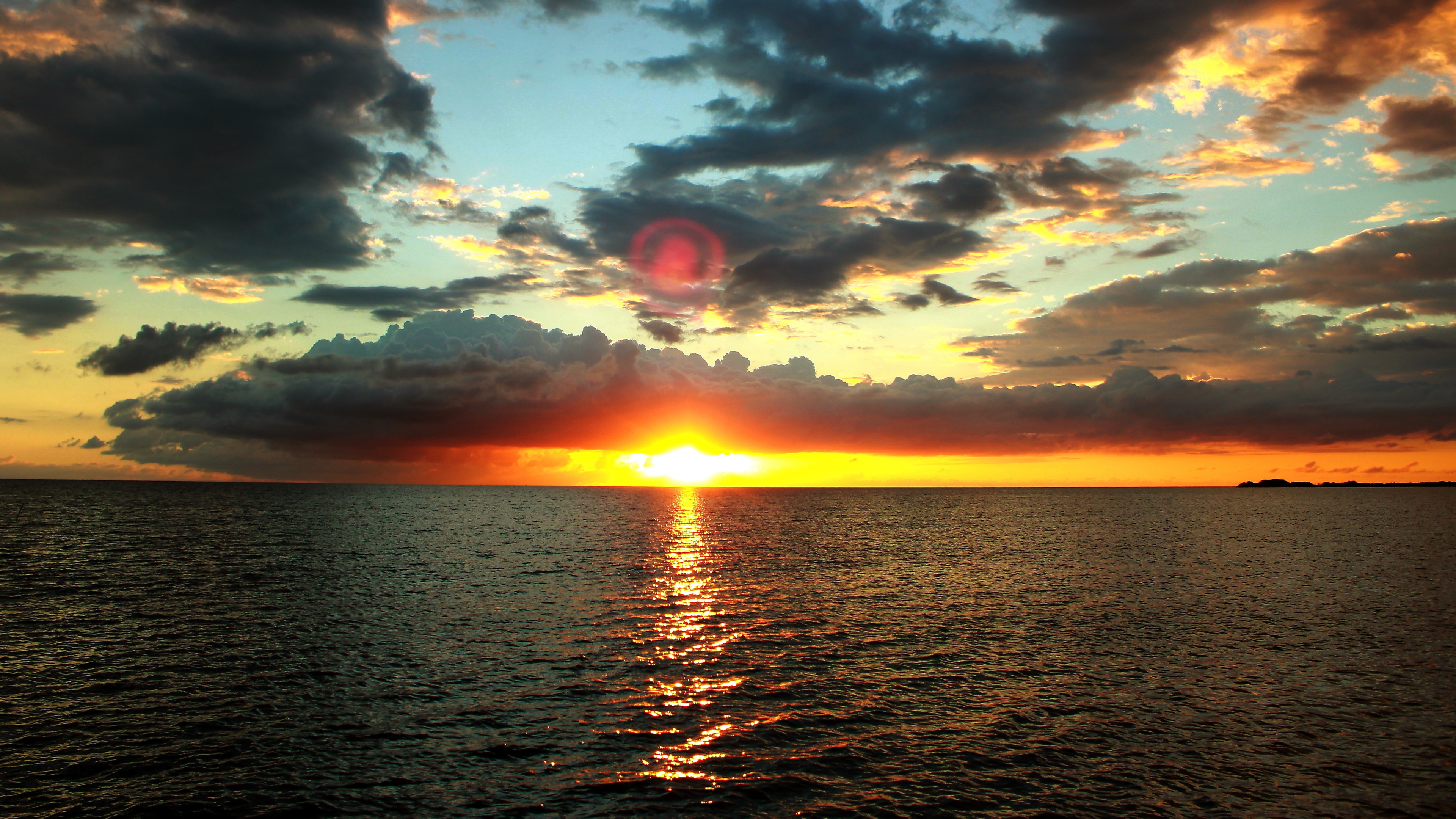 Body of Water Under Cloudy Sky During Sunset. Wallpaper in 3840x2160 Resolution