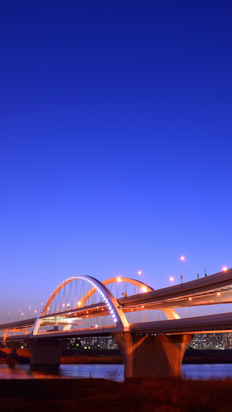 White Bridge Under Blue Sky During Daytime. Wallpaper in 750x1334 Resolution