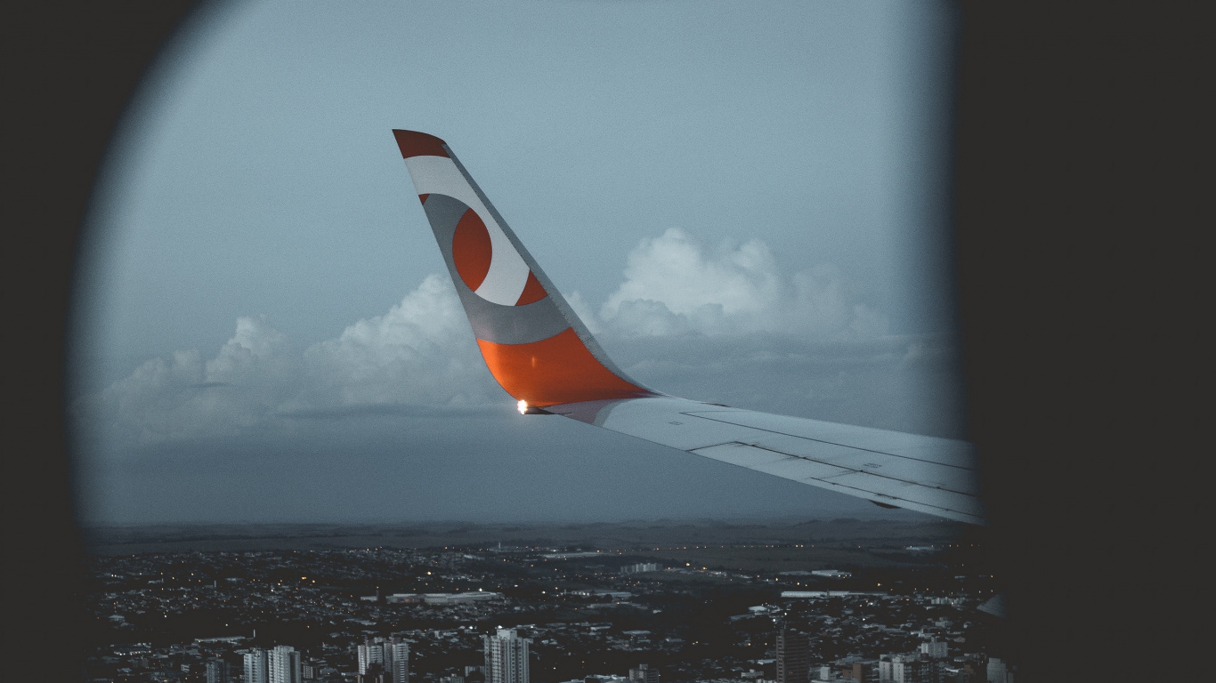 White and Orange Airplane Wing During Daytime. Wallpaper in 1366x768 Resolution
