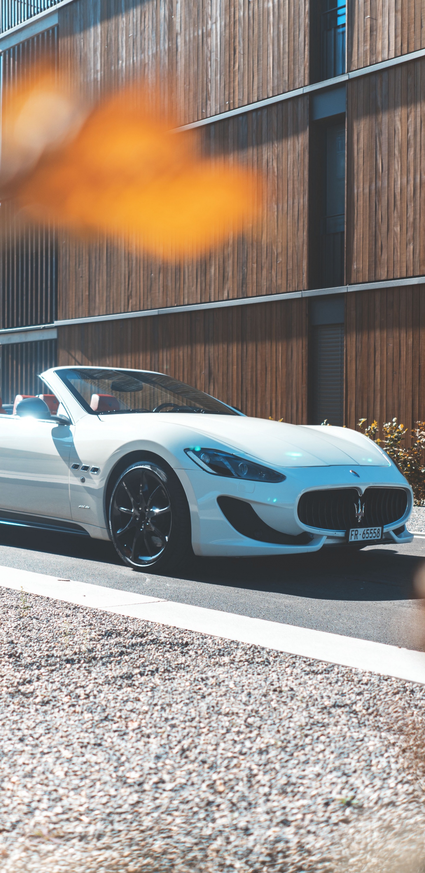 White Coupe Parked on Gray Concrete Road During Daytime. Wallpaper in 1440x2960 Resolution