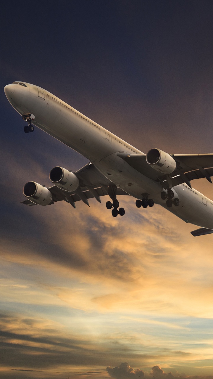 White Passenger Plane in Mid Air During Daytime. Wallpaper in 720x1280 Resolution