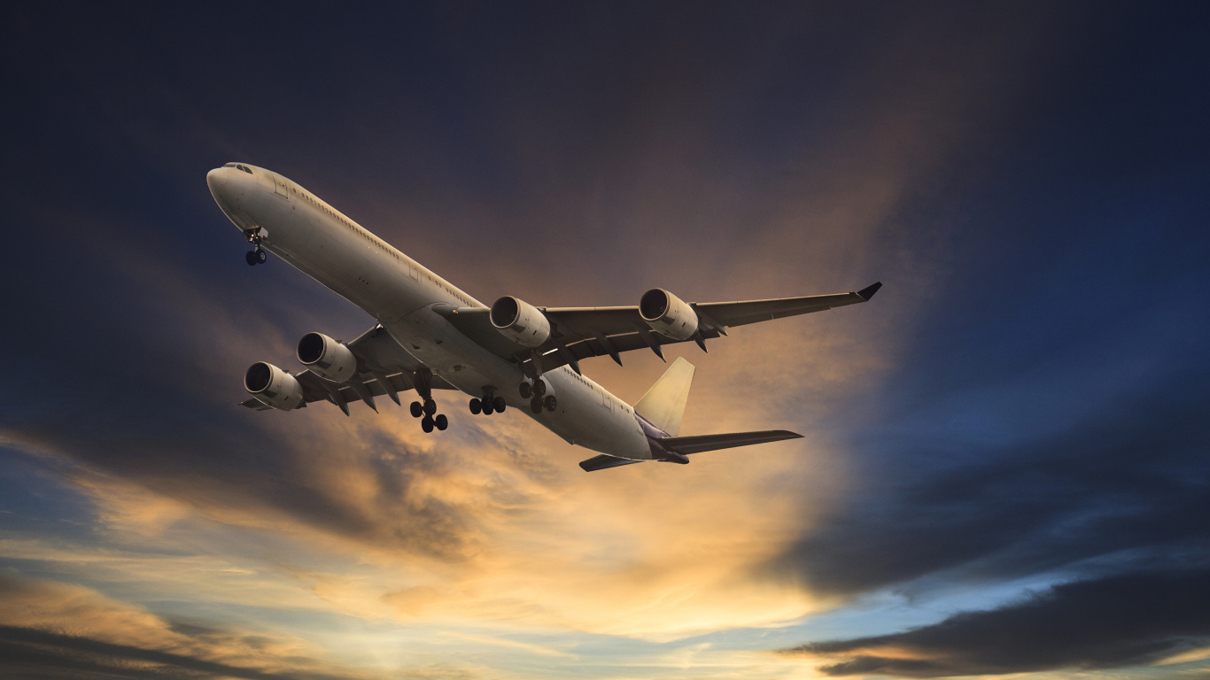 Weißes Passagierflugzeug in Der Luft Tagsüber. Wallpaper in 1366x768 Resolution